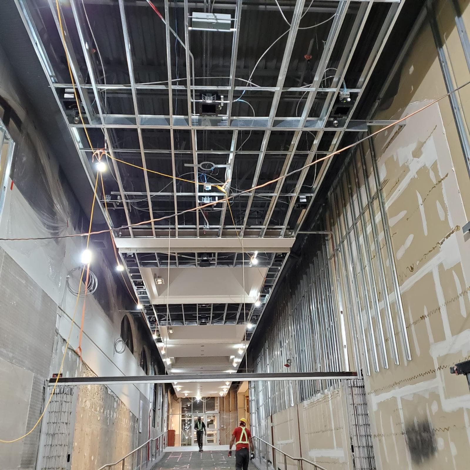 GlassRoc exterior sheathing installation for fire and moisture resistance on a commercial building in Saskatoon, SK